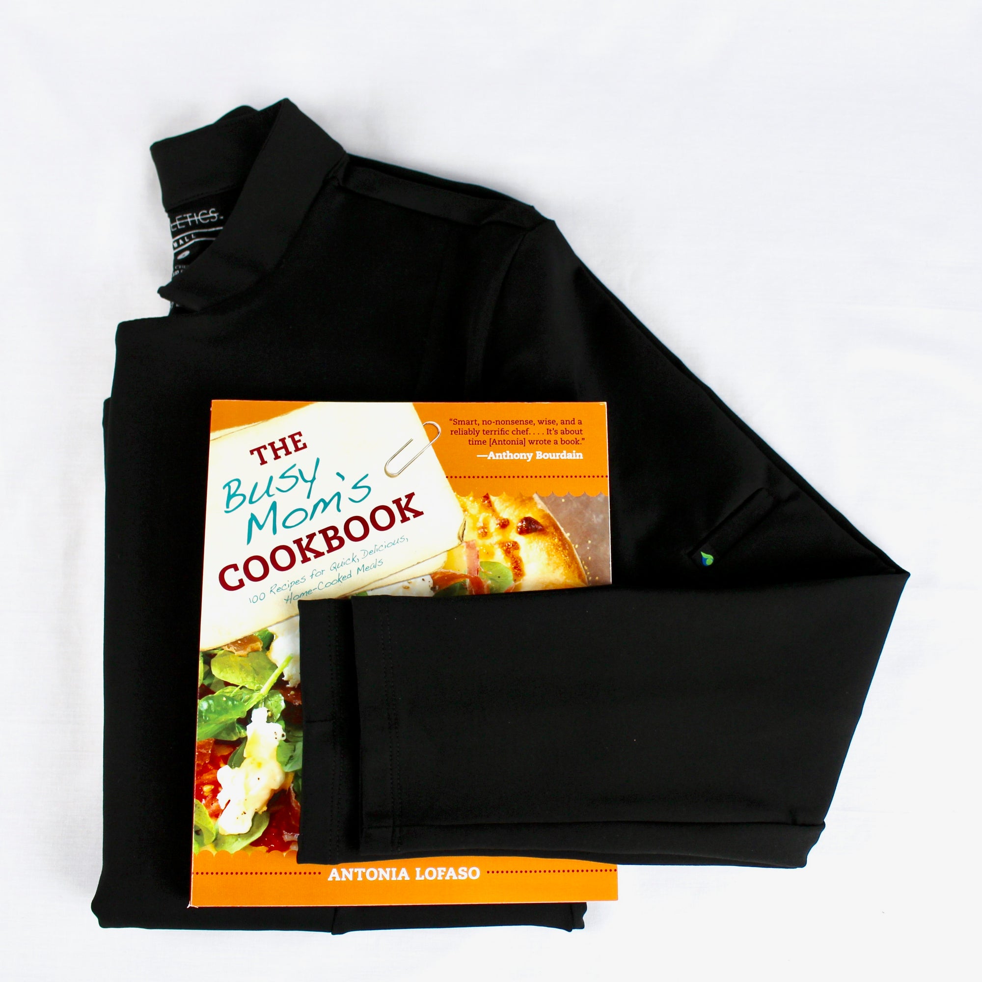cookbook with black chefs coat
